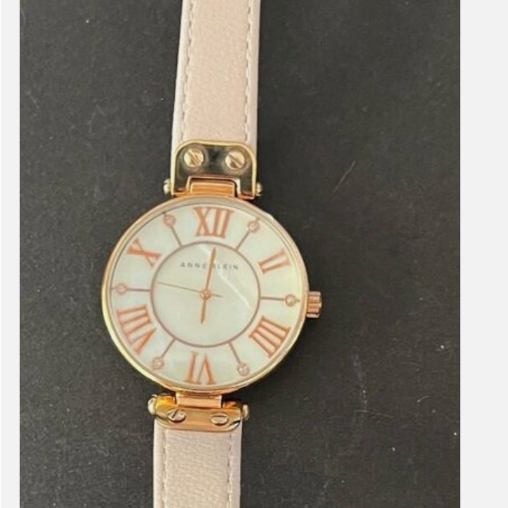 Anne Klein Watch Women 34mm Round MOP Dial Gold Tone Light Pink Band